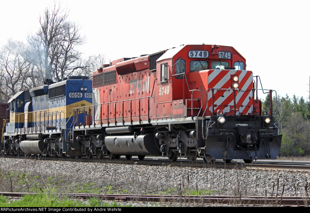 Dual EMD 645s grind it out as the rock train gets moving